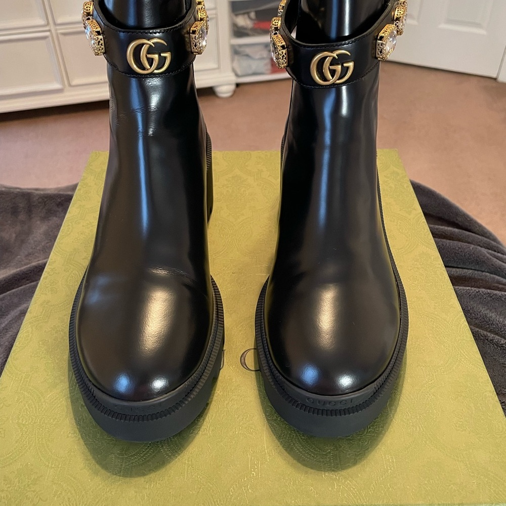 Gorgeous authentic black leather Gucci ankle boot with rhinestone straps.